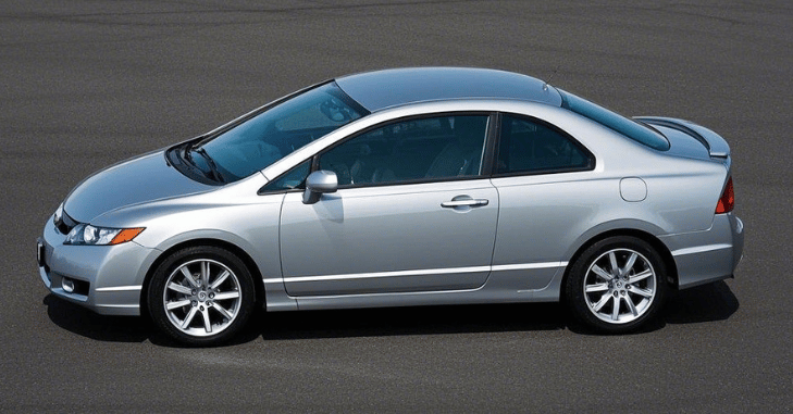 Interior of a 2009 Honda Civic Si with sport seats and steering wheel