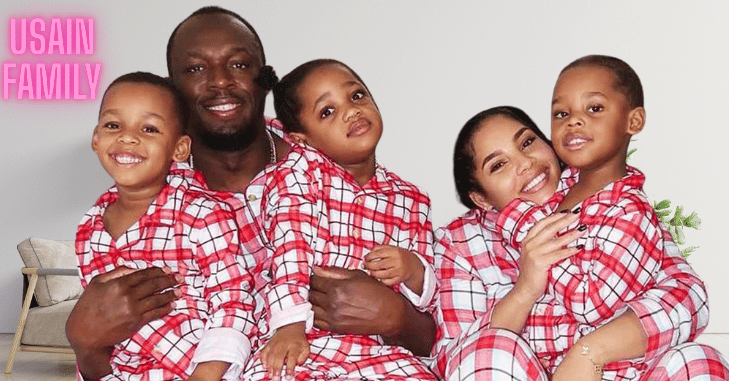 Portrait of Usain Bolt smiling alongside family members