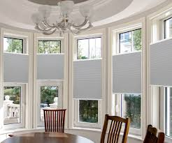 Living room window with energy efficient blinds installed in Boca Raton